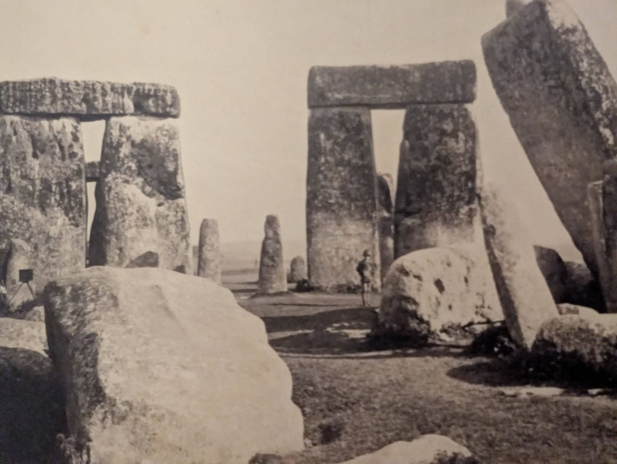 Victorian photograph of Stonehenge with a young boy standing among the stones